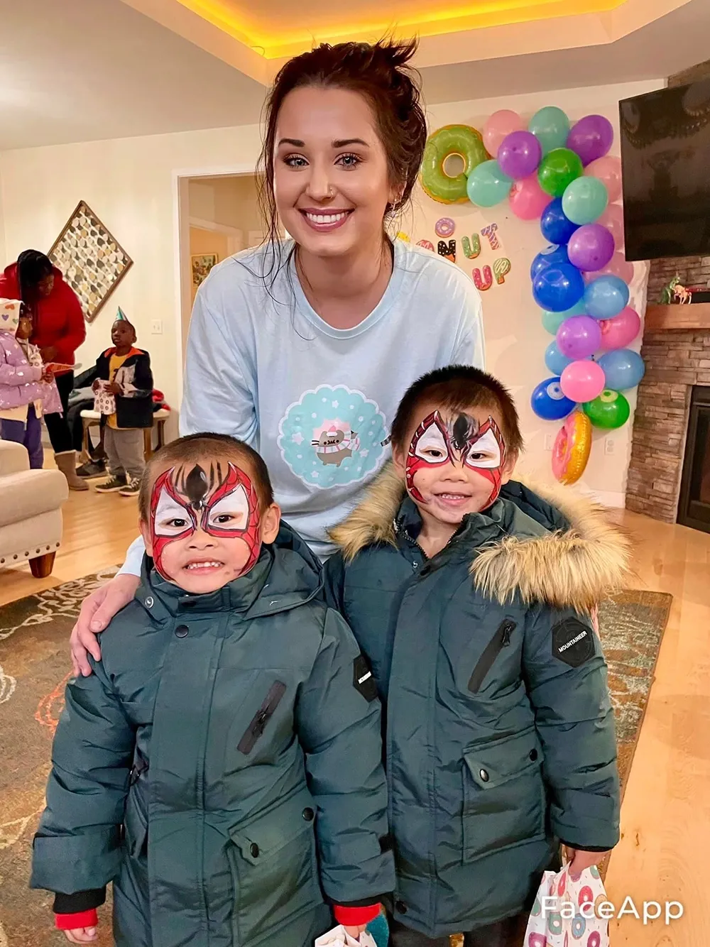 boys with spiderman face paint