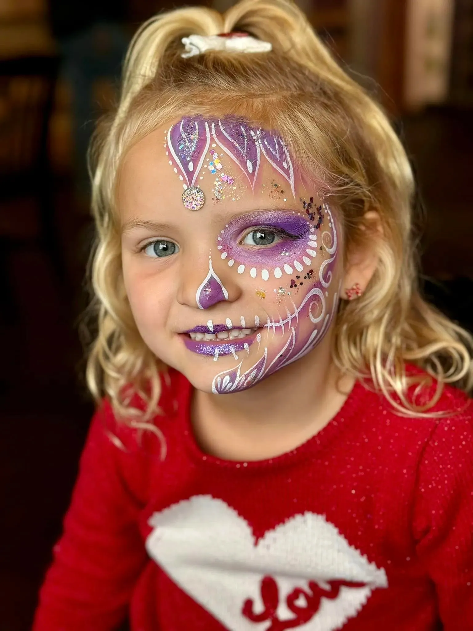 girl with purple skeleton face paint