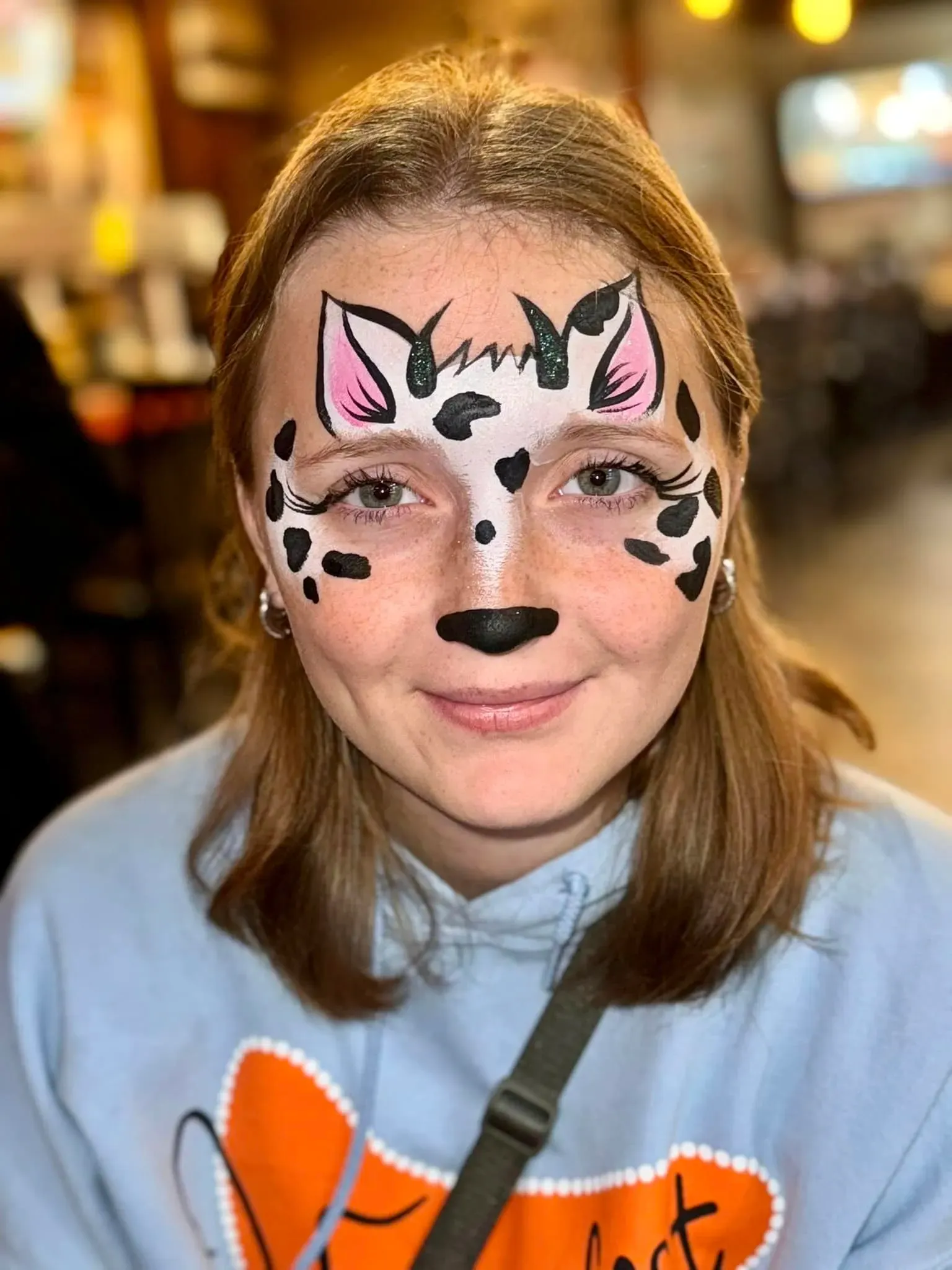 girl with cow face paint