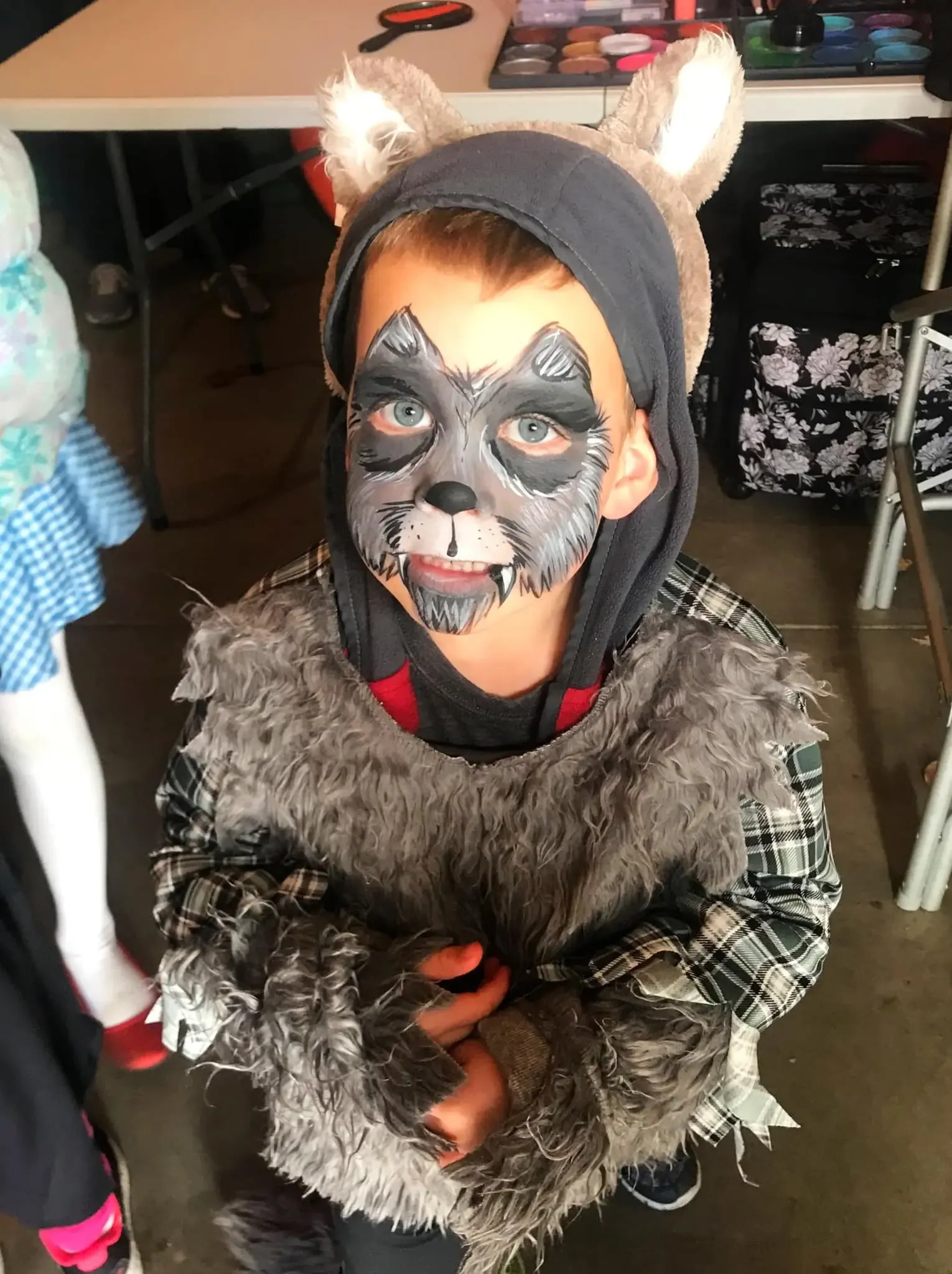 boy with wolf face paint