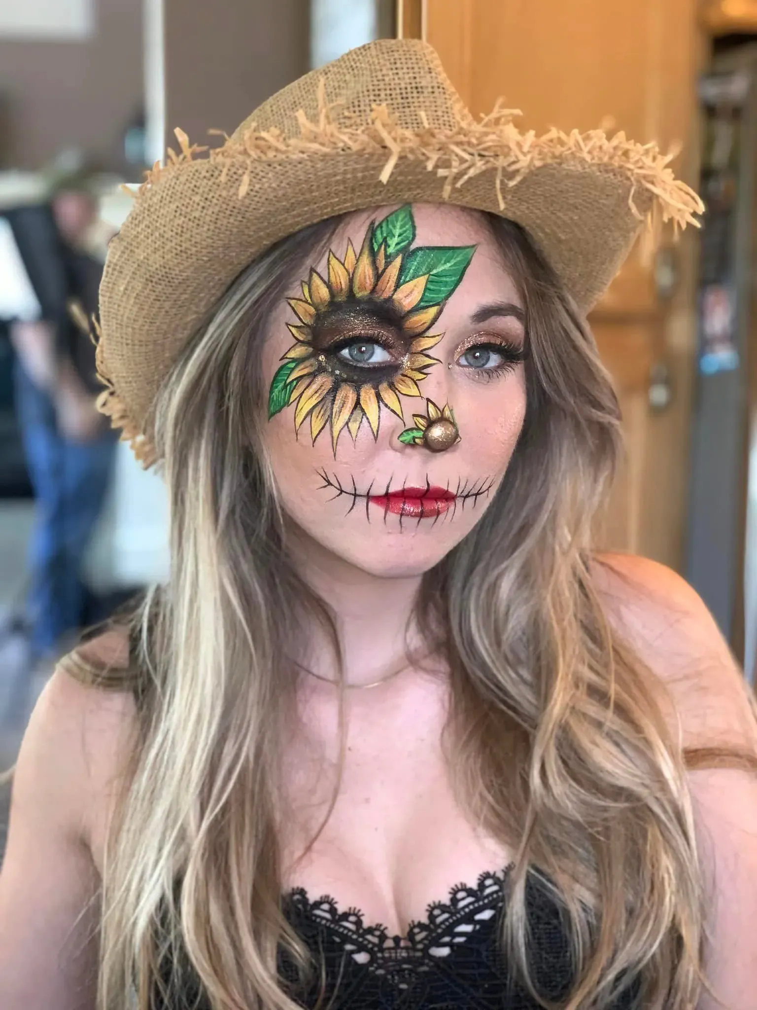 woman with halloween flower face paint